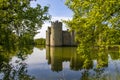 14th century Bodium castle surrounded by a moat in the County of Sussex in England. Royalty Free Stock Photo