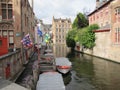 14th century canal in medieval Bruge, Belgium, with modern boats