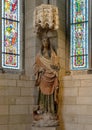 14th century Catalan limestone with paint statue of Saint Margaret of Antioch in the Cloisters in New York City.
