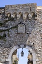 15th century Catania Gate (Porta Catania) at the street Corso Umberto, Taormina, Sicily, Italy Royalty Free Stock Photo