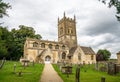 12th Century church of St Michael and All Angels, Withington, Gloucestershire, UK Royalty Free Stock Photo