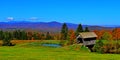 19th Century covered bridge in rolling green mountains of Vermont HDR. Royalty Free Stock Photo