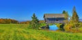 19th Century covered bridge in rural Vermont HDR. Royalty Free Stock Photo