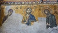 13th century Deesis Mosaic of Jesus Christ flanked by the Virgin Mary and John the Baptist in the Hagia Sophia temple in Royalty Free Stock Photo