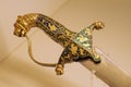 Royal sword handle with lion head hilt decorated in gold on display in the Mehrangarh Fort museum, Jodhpur, Rajasthan, India