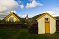 19th century turf houses and a church at Glaumbaer farm Royalty Free Stock Photo