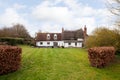 17th century white part thatched cottage Royalty Free Stock Photo