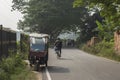 12th December, 2021, Narendrapur, West Bengal, India: A E rickshaw on road of Kolkata