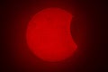 A view of the Sun during a Partial Solar Eclipse, an amazing view of our star shining in H Alpha light. An awe view of the Royalty Free Stock Photo