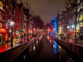 25th Jan 2019, Netherlands, Amsterdam. Night shot of De Wallen or De Walletjes, the largest and best known red-light district Royalty Free Stock Photo