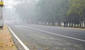 15th January 2023, Kolkata, West Bengal, India. Foggy Kolkata Street during Morning TIme in Winter Royalty Free Stock Photo