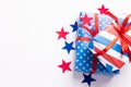 4th of July American Independence Day. Happy Independence Day. Red, blue and white star confetti, paper decorations on white Royalty Free Stock Photo