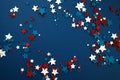 4th of July American Independence Day stars decorations frame on blue background. Flat lay, top view. Royalty Free Stock Photo