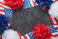 4th of July background. USA paper fans, Red, blue, white stars, balloons, gold confetti on gray dark concrete background. Happy Royalty Free Stock Photo