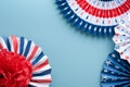 4th of July background. USA paper fans, Red, blue, white stars and confetti on blue wall background. Happy Labor Day, Independence Royalty Free Stock Photo