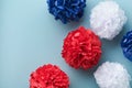 4th of July background. USA paper fans, Red, blue, white stars and confetti on blue wall background. Happy Labor Day, Independence Royalty Free Stock Photo