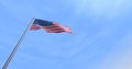 4th July CGI isolated USA flag waving on a blue sky - close up of United States of America national flag flowing in the wind in US Royalty Free Stock Photo