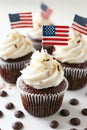 4th of july chocolate cupcakes with cream cheese and eeuu flag on wooden table