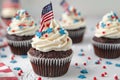 4th of july chocolate cupcakes with cream cheese and eeuu flag on wooden table