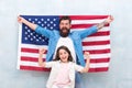 4th of July. Independence day public holiday. Americans celebrate independence day. Father and daughter USA flag Royalty Free Stock Photo