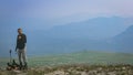 30th of July 2012, Russia, Kemerovo region, traveller at halt on mountains background