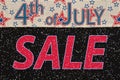 4th of July Sale type message with retro USA stars and stripes ribbon Royalty Free Stock Photo