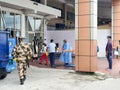 6th June 2020- Bagdogra Airport,Siliguri, West Bengal, India-Passengers in protective gear being sanitized on arrival by airport Royalty Free Stock Photo