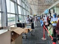 6th June 2020- Netaji Subhas Chandra Bose International Airport, Calcutta, India-Travellers boarding flights in queue maintaining Royalty Free Stock Photo