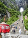 28th of May, 2018: Incense Pot, tourist taking pictures and stepping down the steep 999 stairs at the Tianmen Mountain with a view