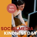 9th nov, social media kindness day text over caucasian businesswoman working over computer in office Royalty Free Stock Photo
