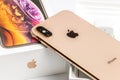 12th October,2018-Kiev,Ukraine: Latest Iphone XS on opened box on white table. Newest Apple smartphone on white branded