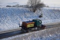 ThÃ¼r, Germany - 2023-01-21: AWD truck trying to clear the road from already hardened snow