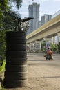 26th September, 2021, Kolkata, West bengal, India: A tyre repair shop placed few tubes as symbol of his shop. Selective focus