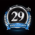 29th silver anniversary logo with blue ribbon and ring