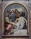 14th Stations of the Cross, Jesus is laid in the tomb and covered in incense Royalty Free Stock Photo