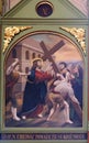 5th Stations of the Cross, Simon of Cyrene carries the cross Royalty Free Stock Photo