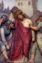 5th Stations of the Cross, Simon of Cyrene carries the cross Royalty Free Stock Photo