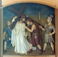 5th Stations of the Cross, Simon of Cyrene carries the cross Royalty Free Stock Photo