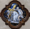 5th Stations of the Cross, Simon of Cyrene carries the cross Royalty Free Stock Photo