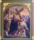 5th Stations of the Cross, Simon of Cyrene carries th cross Royalty Free Stock Photo