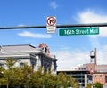 16th Street Mall street sign with Union Station in the background in downtown Denver