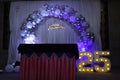 25th wedding anniversary backdrop with balloon decoration in the night