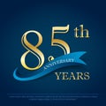 85th years anniversary celebration emblem. elegance golden anniversary logo with blue ribbon on dark blue background, vector