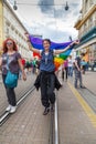 15th Zagreb pride. LGBTIQ activist holding flag.