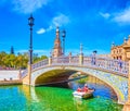 Tha small tourist boat on the canal of Plaza de Espana in Seville, Spain Royalty Free Stock Photo
