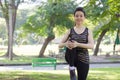 Thai adult beautiful girl doing yoga exercises in the park