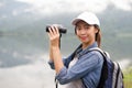 Thai adventure girl happy with her bird wathcing