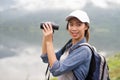 Thai adventure girl happy with her bird wathcing