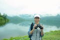 Thai adventure girl happy and holding a binoculars