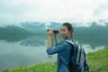 Thai adventure girl happy with her bird wathcing